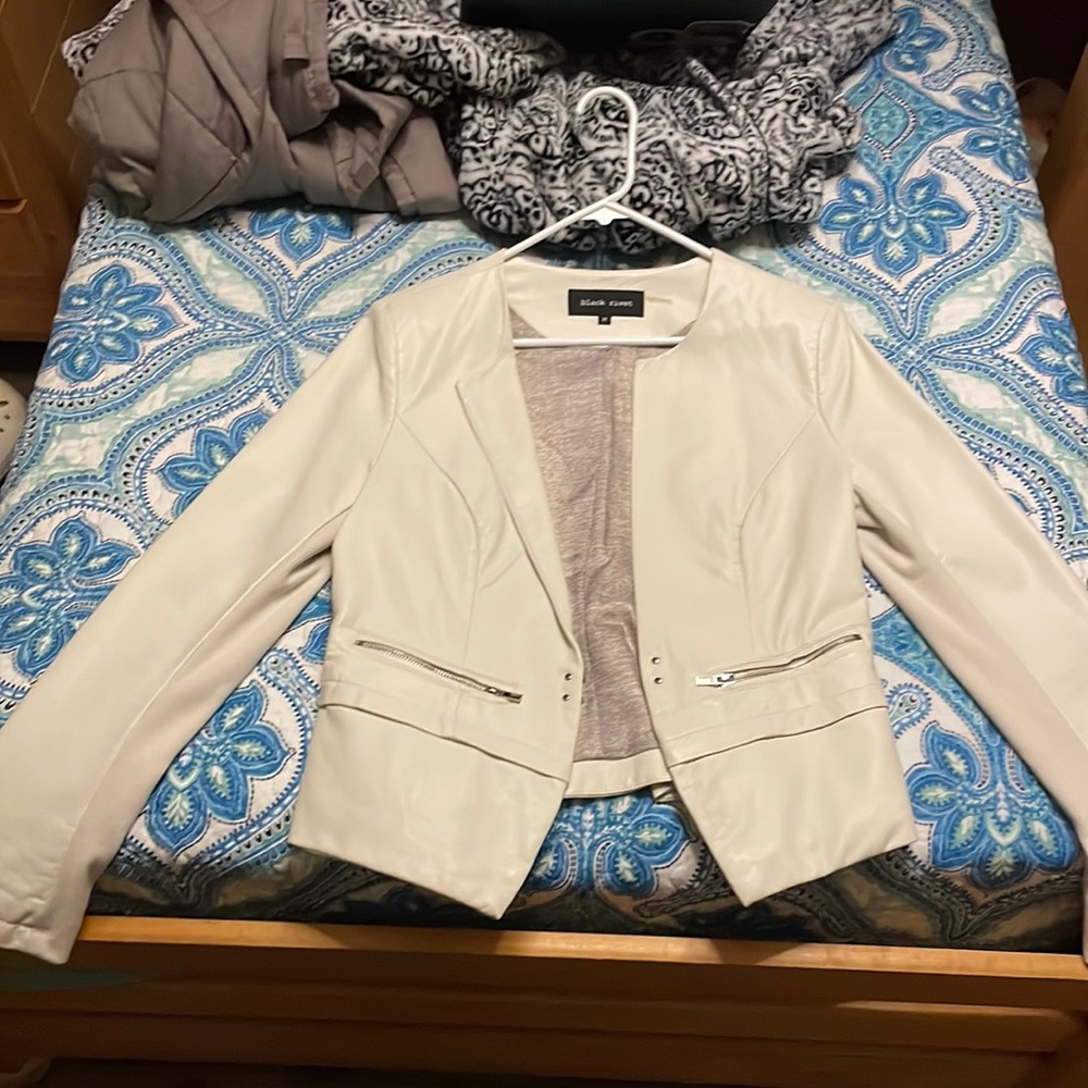 Real white leather, black rivet jacket.
